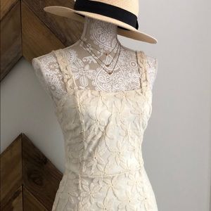 Floral embroidered cream dress.